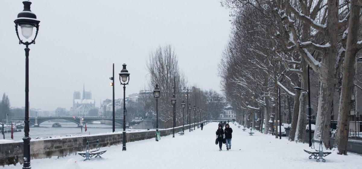 Quai de la Rapee in the snow, view of Notre Dame Cathedral