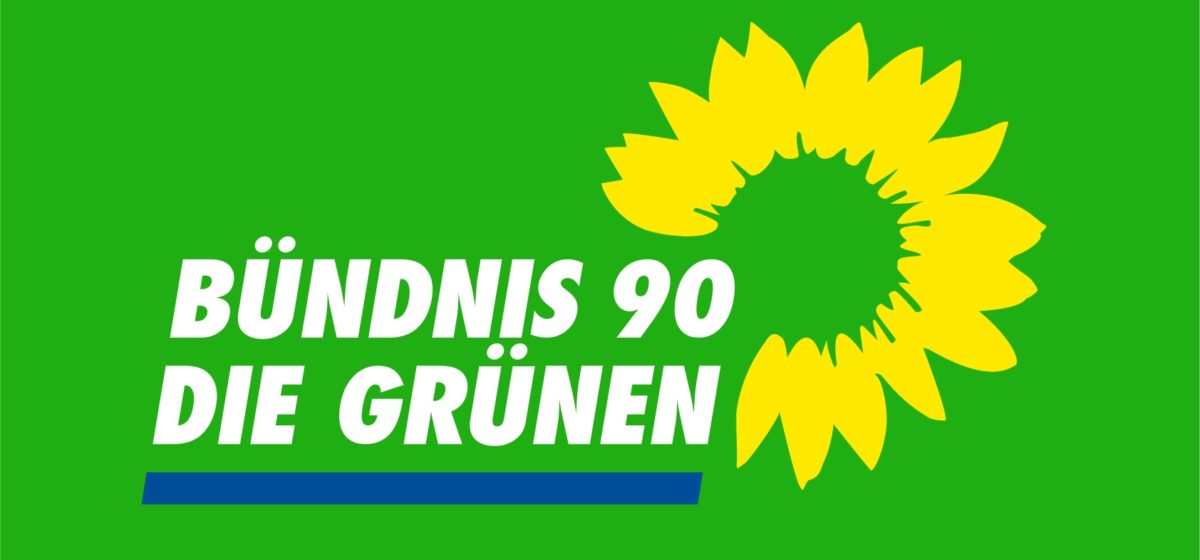 logo of the German Green party, reading Bündnis 90 die Grünen with a green background and yellow sunflower