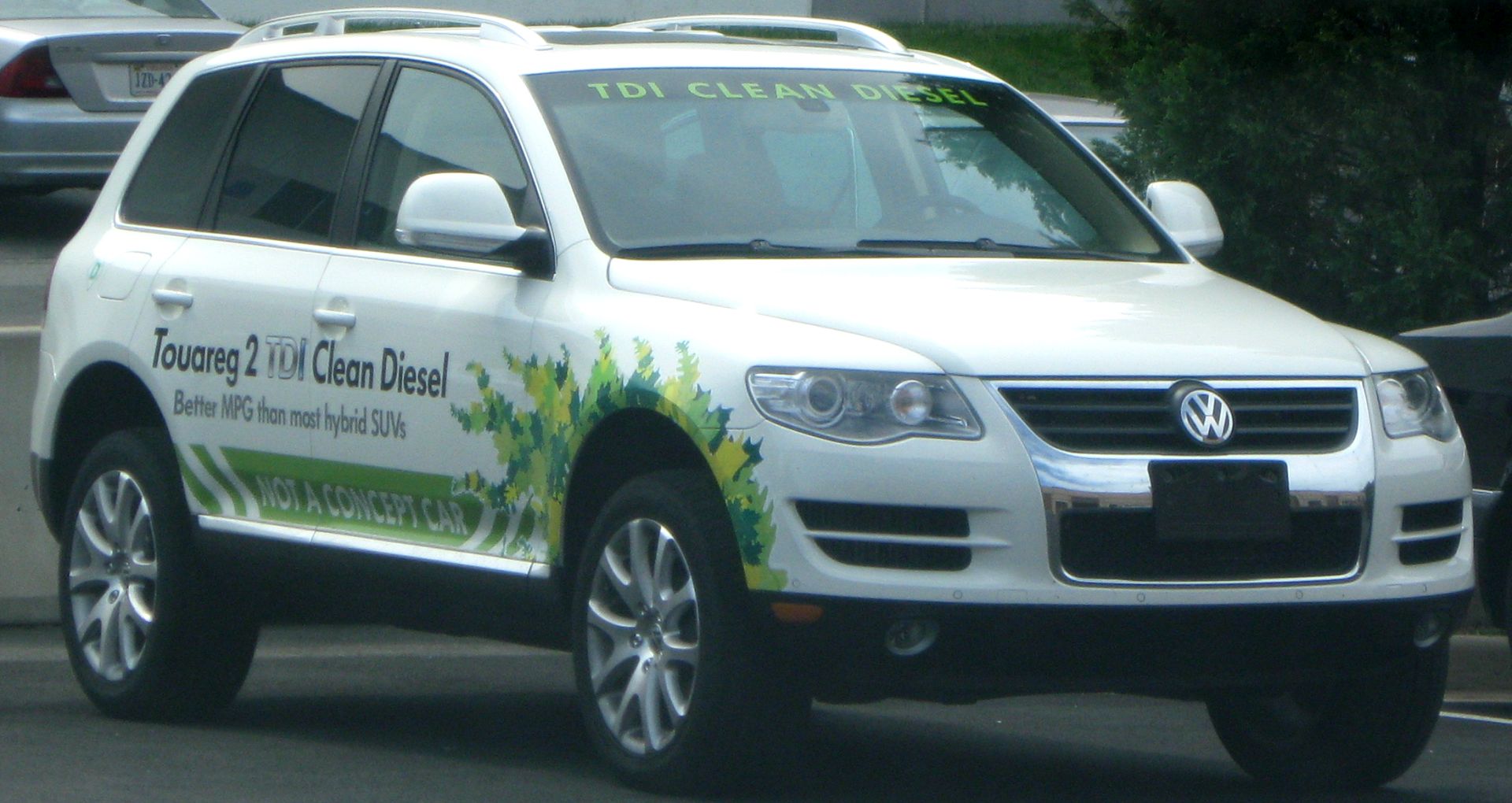 2009 Volkswagen Touareg with graphic of leaves and text reading clean diesel