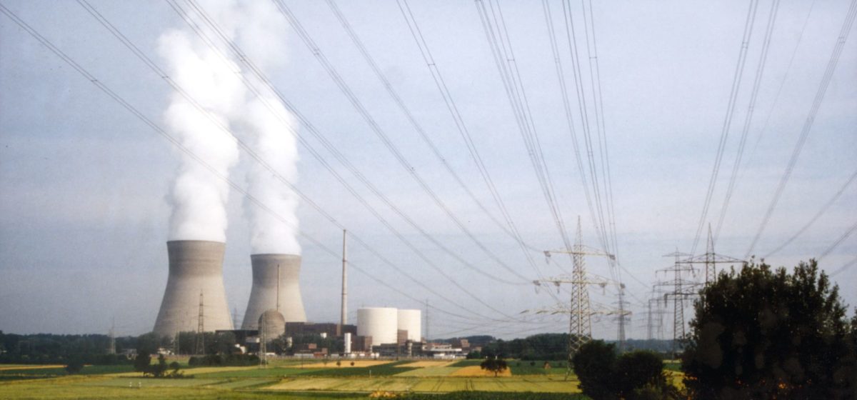 view of the cooling towers with steam, clouds